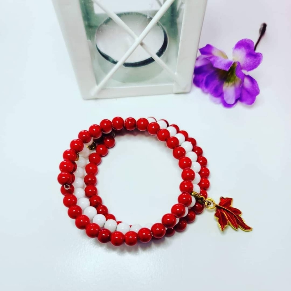 Coral and agate bracelet with Maple leaf charm